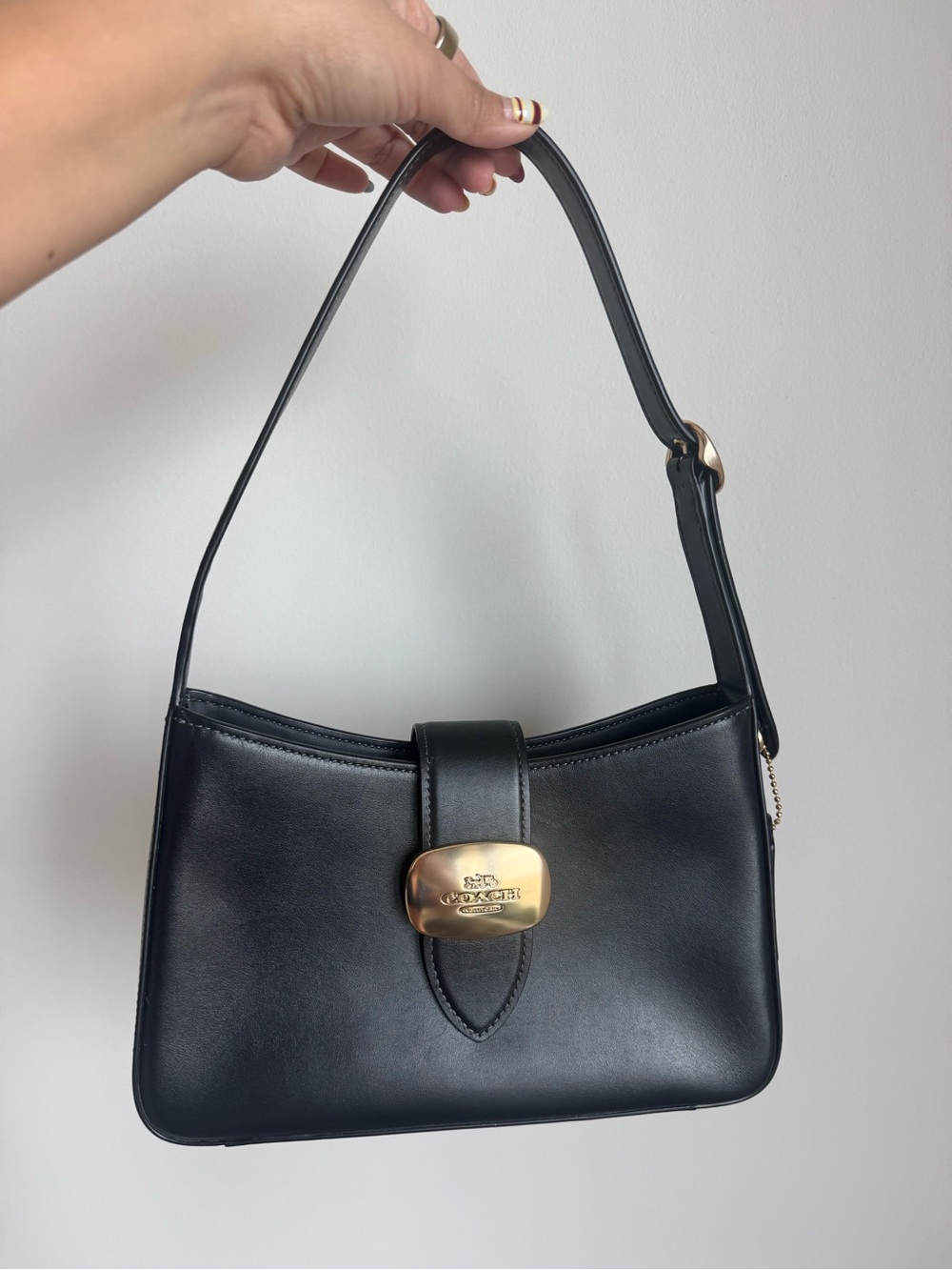 Coach Black Leather Shoulder Bag with Gold Plaque Closure